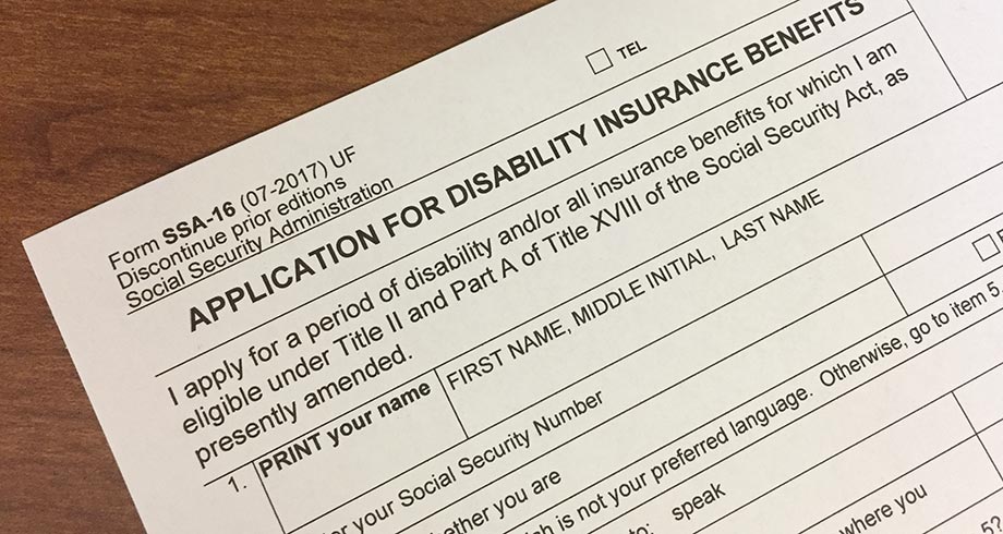 Social Security Disability Insurance application sitting on a desk.
